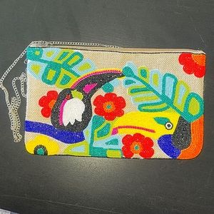 Finely beaded clutch with a chain